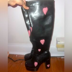 Stylish Black Boots with Pink Heart Accents